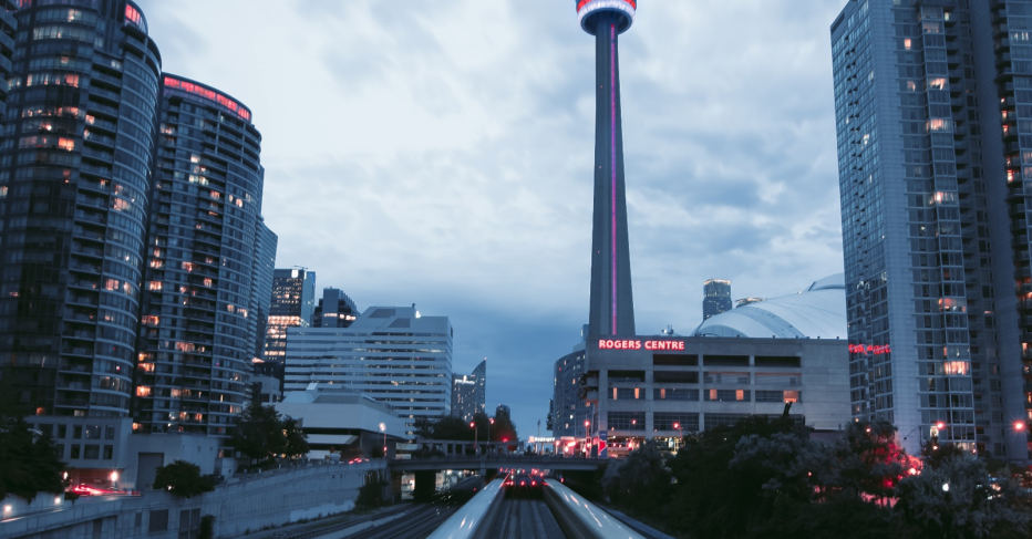 Toronto cityscape at dusk with lit up buildings