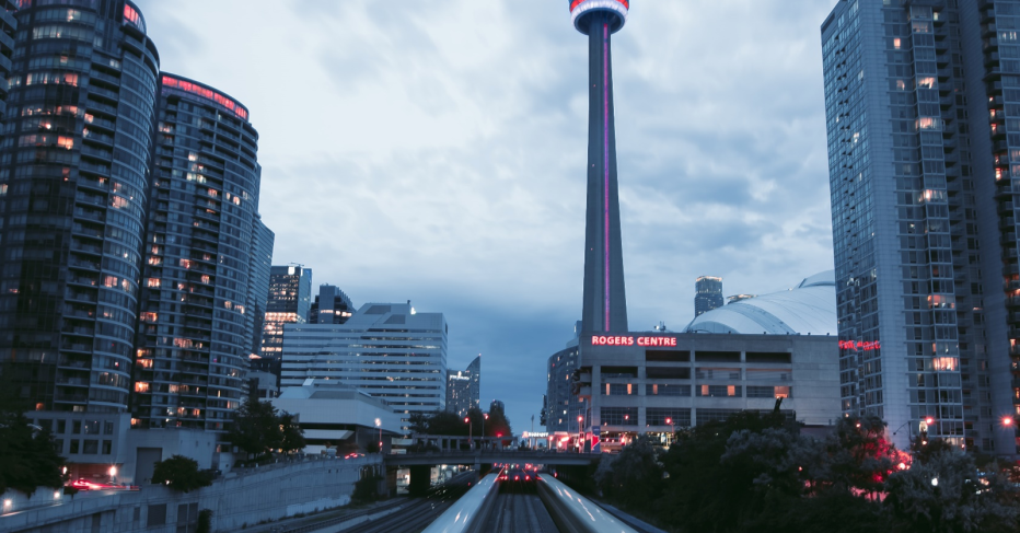 Toronto cityscape at dusk with lit up buildings 