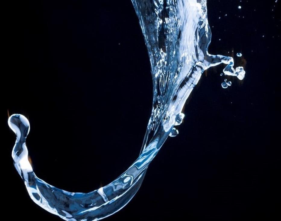 Stock image of water splash on a black background