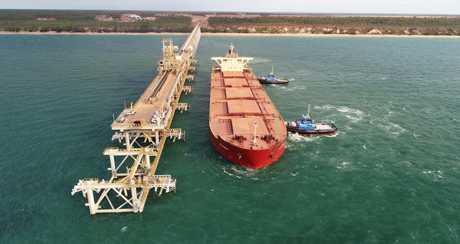 Cargo boat leaving pontoon dock