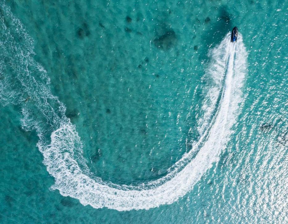 Arial view of jet ski on tropical water