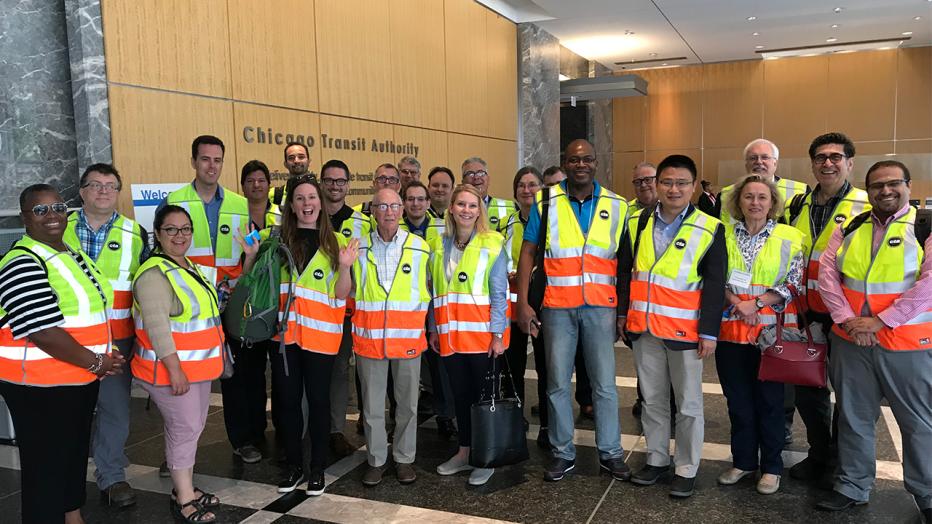 Group of diverse adults in safety vests
