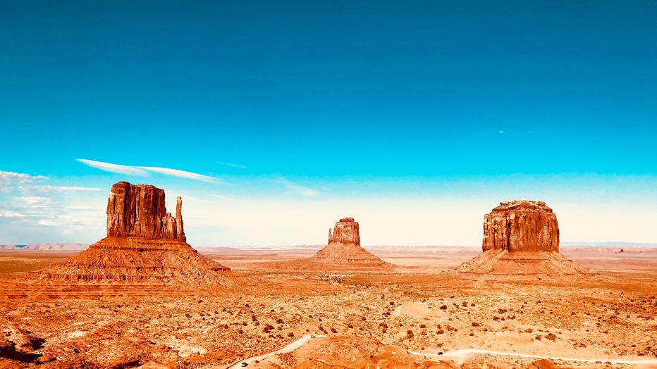 Red desert with blue sky