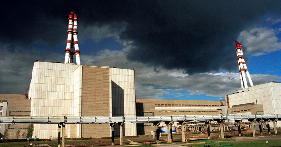 Power plant under dark skies