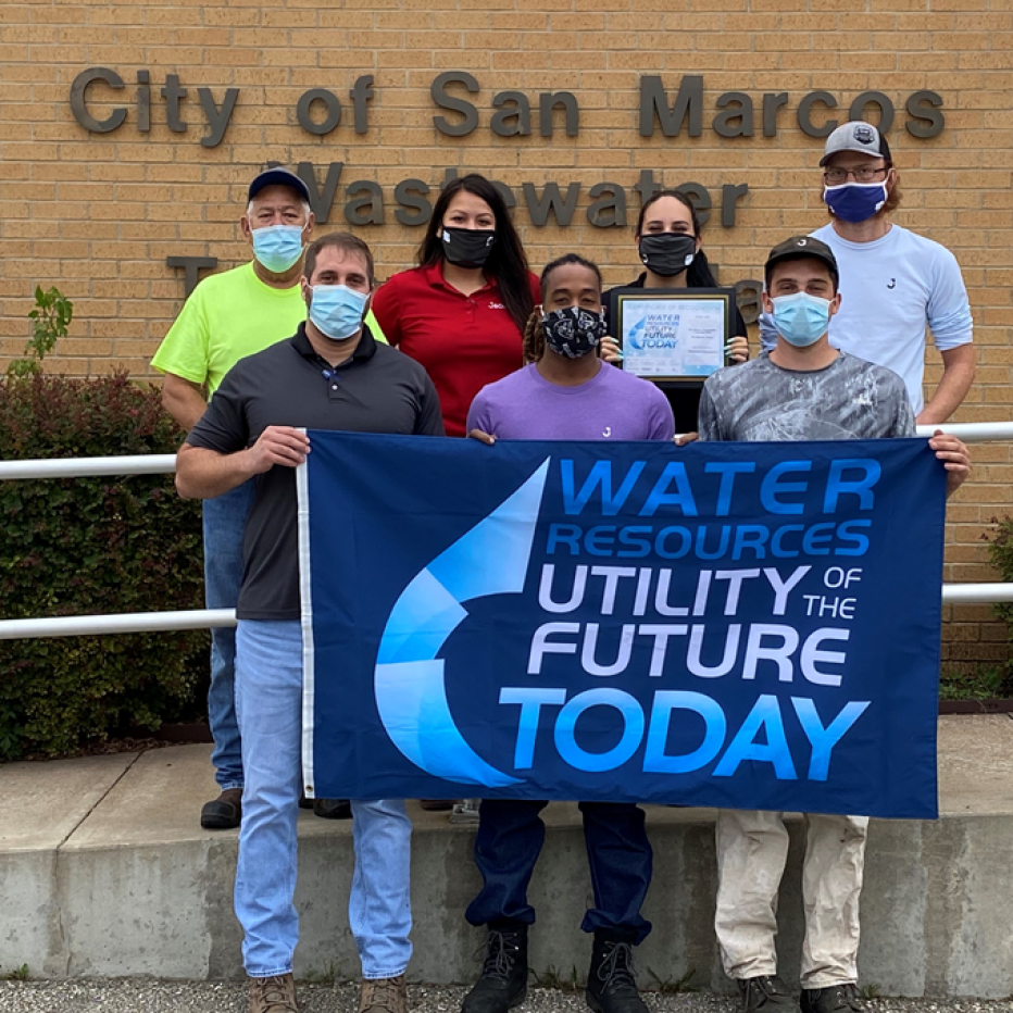 City of San Marcos Watewater team standing with water resources utility of the future today banner