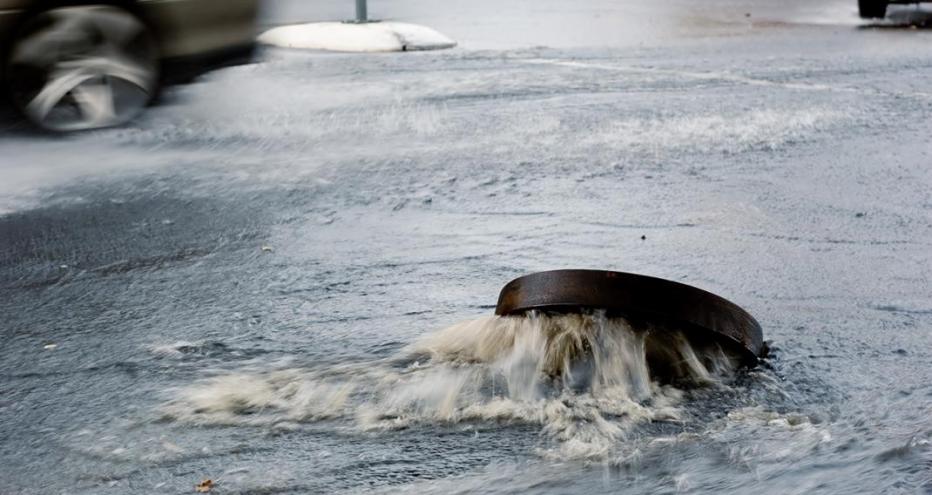 Stock image of overflowed sanitary sewer