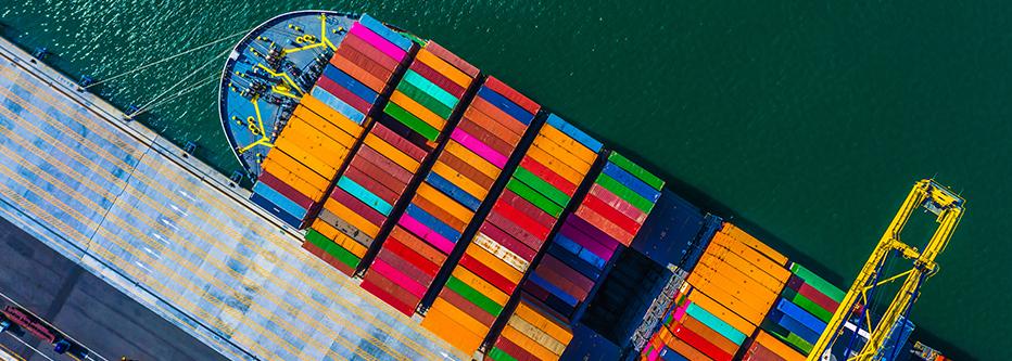 Colorful container ship at a port 