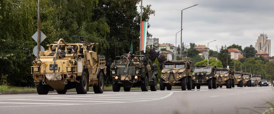 Jackal and Foxhound vehicles traveling in convoy through Bulgaria