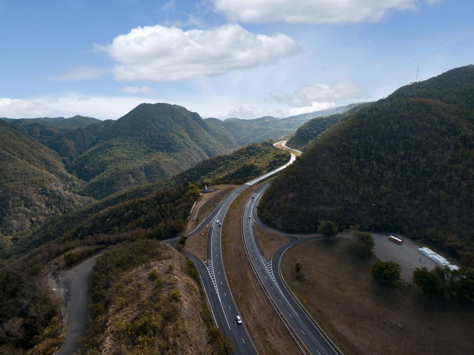 Aerial view of highway through the central mountain range in Puerto Rico.