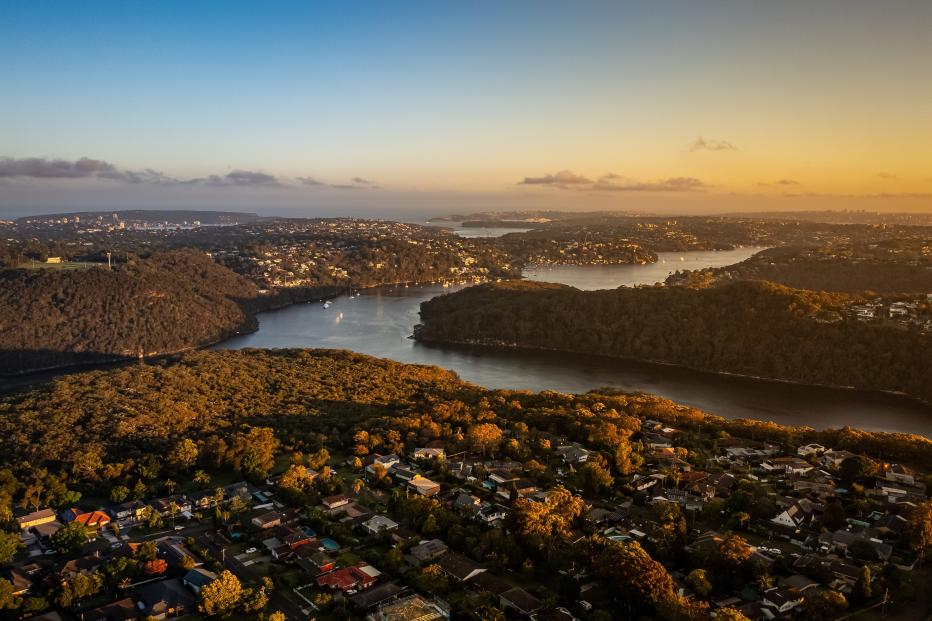 Sunset over suburbs of Sydney Australia, drone aerial view