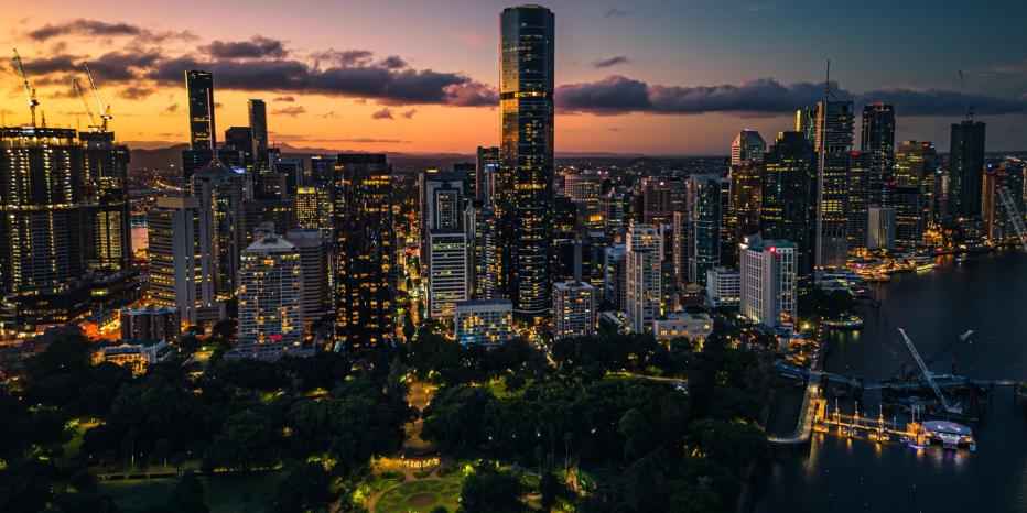 vibrant cityscape of Brisbane at dusk, viewed from an elevated perspective