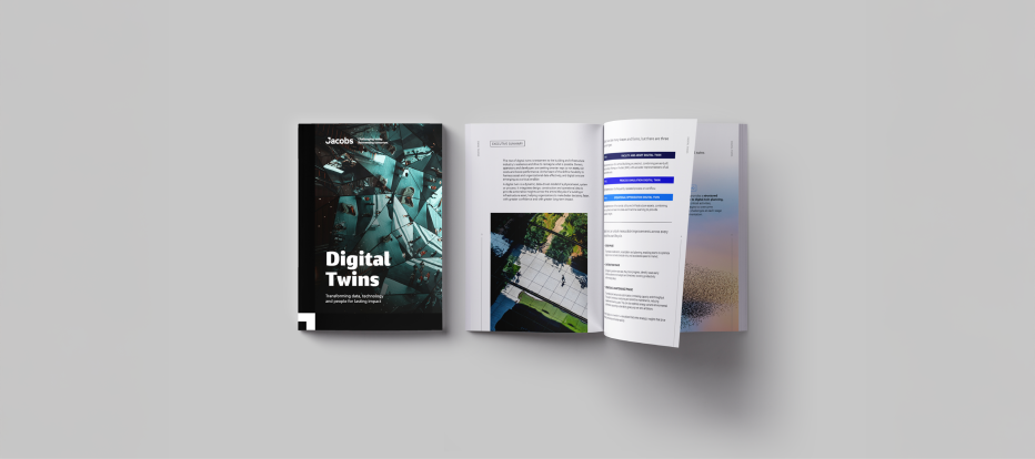 Flatlay of report 'Digital Twins' by Jacobs, showing both the cover and an open spread with text and photos