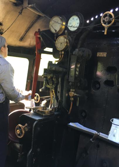 Steph Elwood driving a steam locomotive