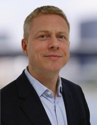 Dr. Iain Tromans