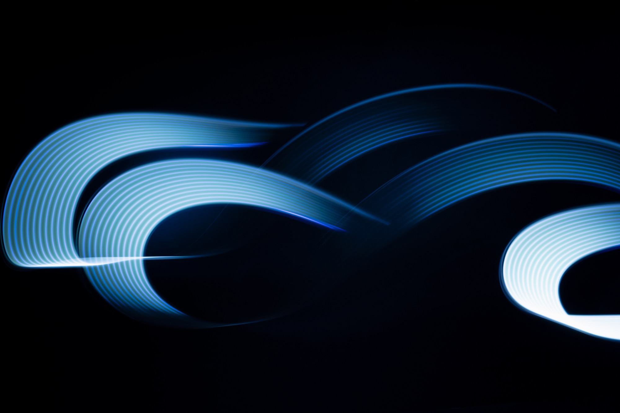 Abstract blue long-exposure light trails